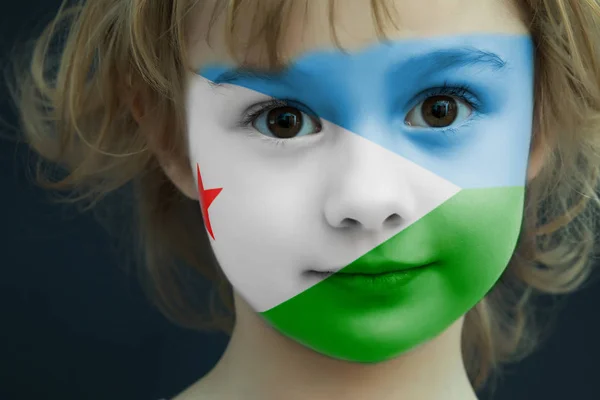 Child with a painted flag of Djibouti — Stock Photo, Image