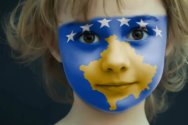 Child with a painted flag of Kosovo — Stock Photo, Image