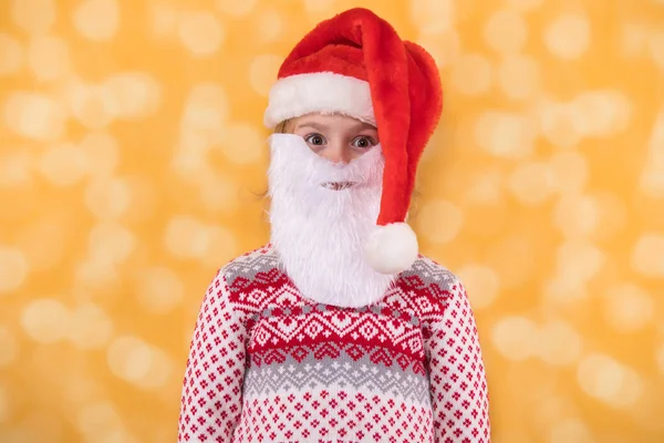 Child in Santa Claus hat and with beard — Stock Photo, Image