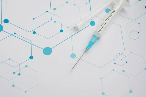Medical syringe on the science background — 스톡 사진