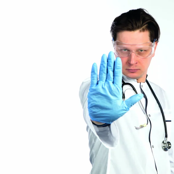 Doctor man protects against viruses — Stockfoto