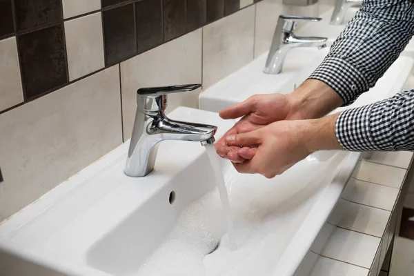 Washing of hands with soap under hot water. — Stock Photo, Image