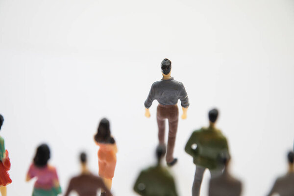 Игрушка, миниатюрные фигурки человека в костюмах
.