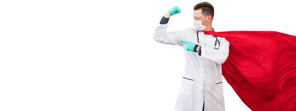 En läkare i en superhjältes dräkt står på försvar mot en viruspandemi. — Stockfoto