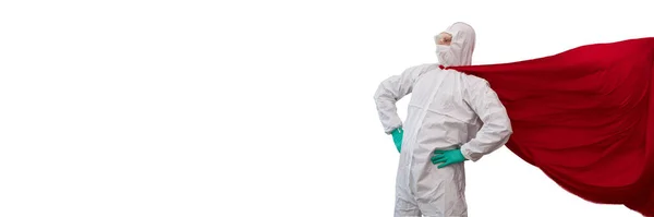 A doctor in a costume of a super hero stands on defense against a viral pandemic — Stock Photo, Image