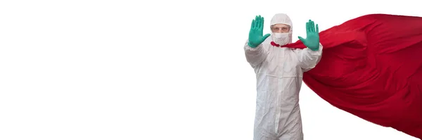 A doctor in a costume of a super hero stands on defense against a viral pandemic — Stock Photo, Image