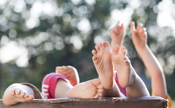 Feet in grass — Stock Photo, Image