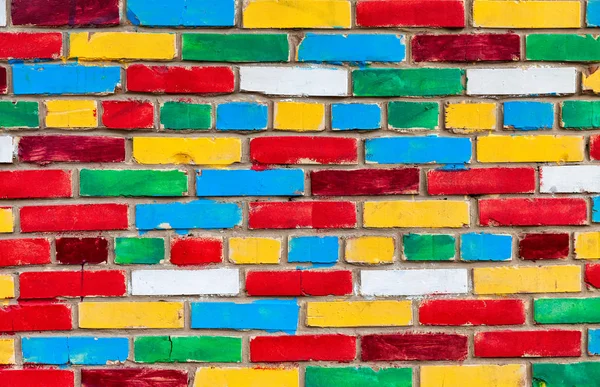 Красочная кирпичная стена из разноцветного кирпича в качестве креативной спинки — стоковое фото