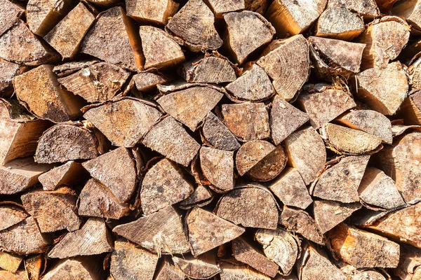 Chopped and stacked up dry firewood as background — Stock Photo, Image