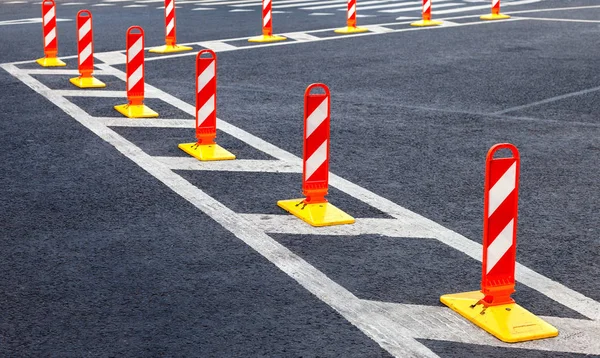 Traffic safety. Traffic markings on a gray asphalt. Red and whit — Stock Photo, Image