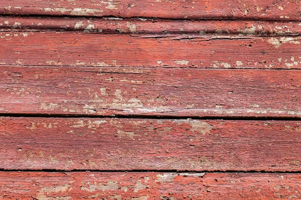 Velhas tábuas de madeira áspera com rachaduras como fundo — Fotografia de Stock