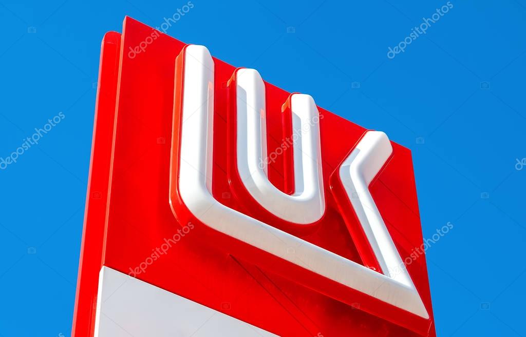 MOSCOW, RUSSIA - JULY 11, 2016: The emblem of the oil company Lukoil against the the blue sky. Lukoil is one of the largest russian oil companies