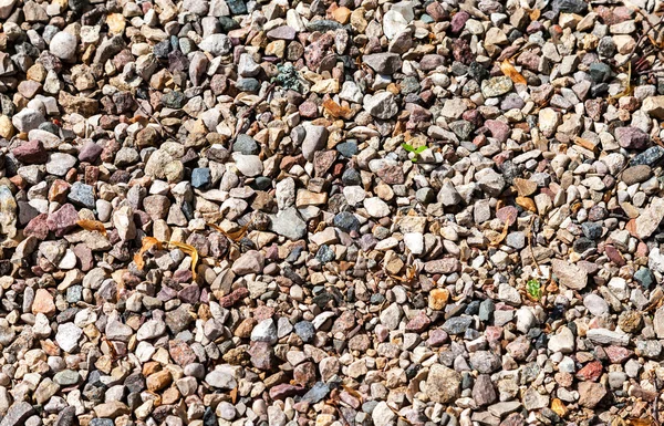 Grijze grind textuur nuttig als achtergrond — Stockfoto