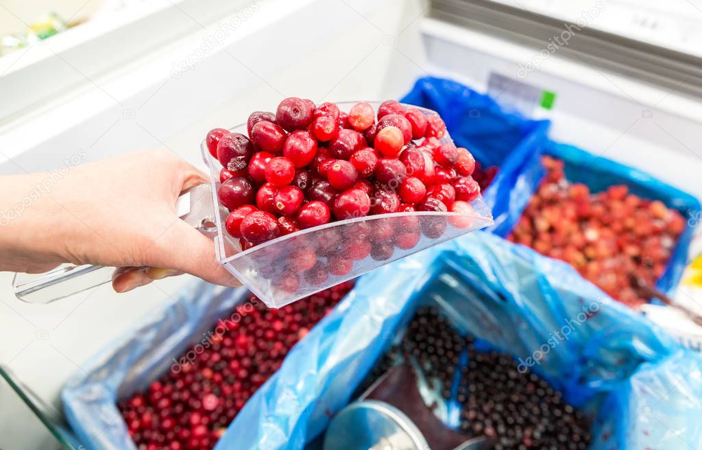 Sale of fresh frozen berries in a supermarket