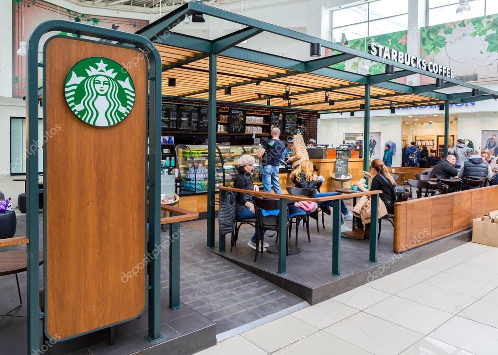 SAMARA, RUSSIA - APRIL 1, 2017: Starbucks cafe interior in Samara  shopping center Kosmoport. Starbucks Corporation is an American global coffee company and coffeehouse chain