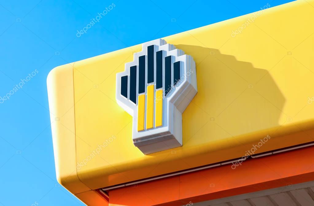 Samara, Russia - may 14, 2016: Emblem of the oil company Rosneft against the blue sky. Rosneft is one of the largest russian oil companies