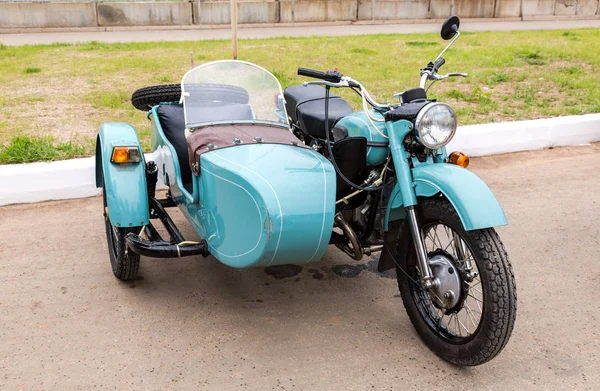 Ural motorcycle parked at the city street in summer day — Stock Photo, Image