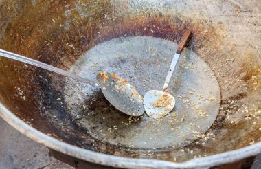 Empty cauldron for cooking traditional pilaf, street food clipart