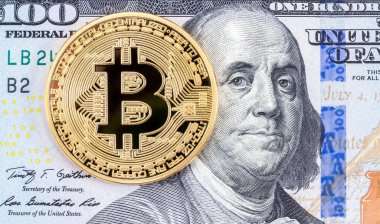 Altın bitcoin yalan üzerinde 100 Amerikan Doları bill clos