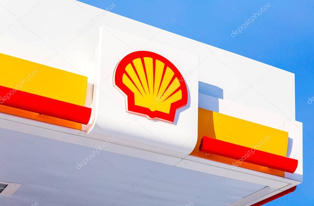 Samara, Russia - January 8, 2018: Emblem of the Royal Dutch Shell oil company against the blue sky