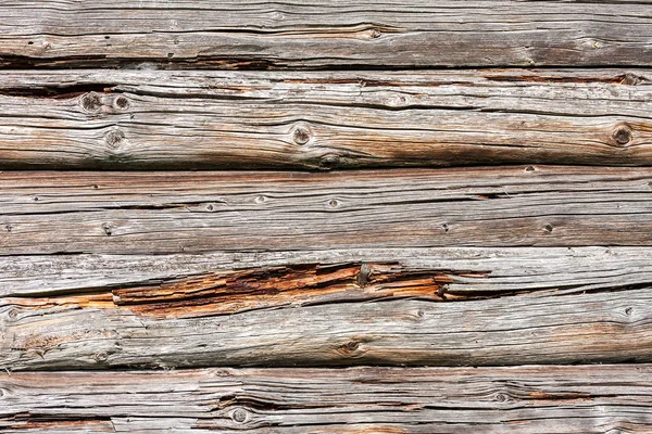 Wooden logs wall of old rural house as background texture — Stock Photo, Image