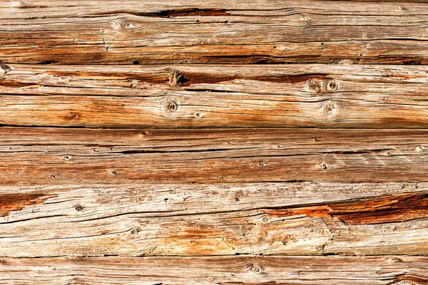 Wooden logs wall of old rural house as background texture — Stock Photo, Image