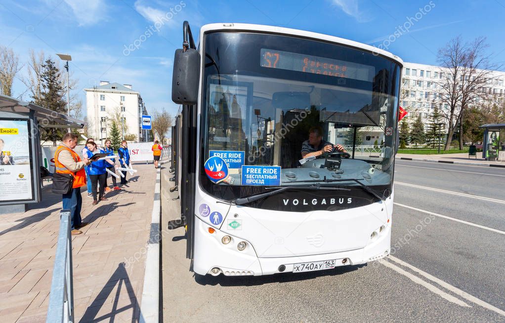 Samara, Russia - May 6, 2018: Shuttle bus for the 2018 FIFA World Cup at the bus stop on city street