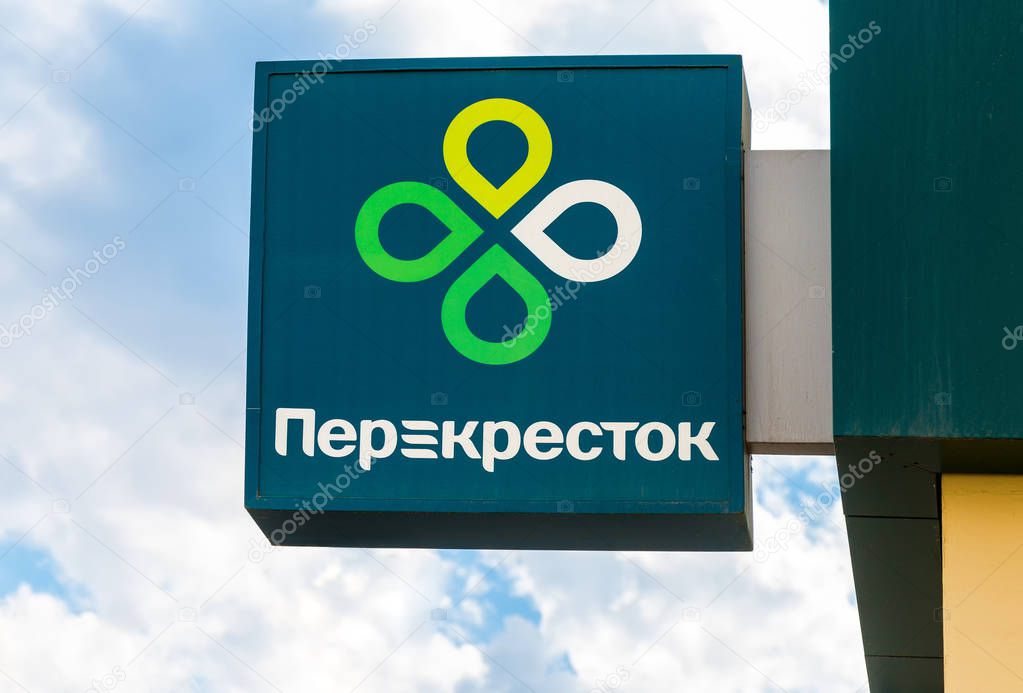 Samara, Russia - May 9, 2018: Emblem of a Perekrestok Store against the sky. Perekrestok is a Russian supermarket chain operated by X5 Retail Group