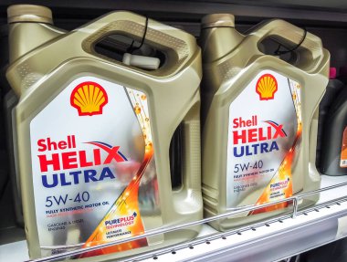 Shell Helix Ultra motor oil in plastic canisters