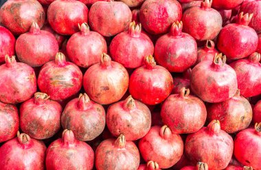 Background from red fresh pomegranate fruits