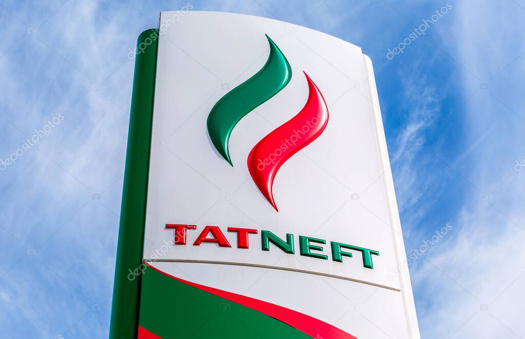 Samara, Russia - May 9, 2017: Logo of the oil company Tatneft against the blue sky. Tatneft - one of the russian oil companies