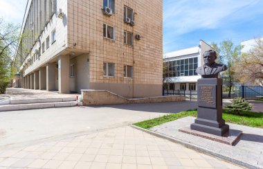 Samara, Russia - May 6, 2018: Monument to the Sergey Korolev, famous soviet rocket creator and spacecraft engineer near the Samara State University clipart