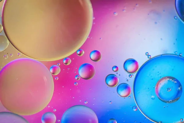 Разноцветная абстрактная раскрашенная фоновая фотография, сделанная из масла, воды и мыла — стоковое фото
