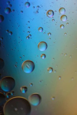 Yağ, su ve sabundan yapılmış çok renkli soyut arka plan resmi