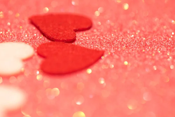 Corações sobre fundo abstrato rosa com bokeh — Fotografia de Stock