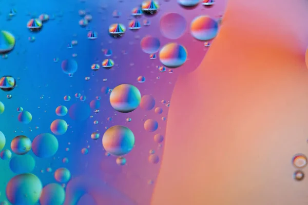 Immagine astratta di sfondo arancione e blu fatta con olio, acqua e sapone — Foto Stock