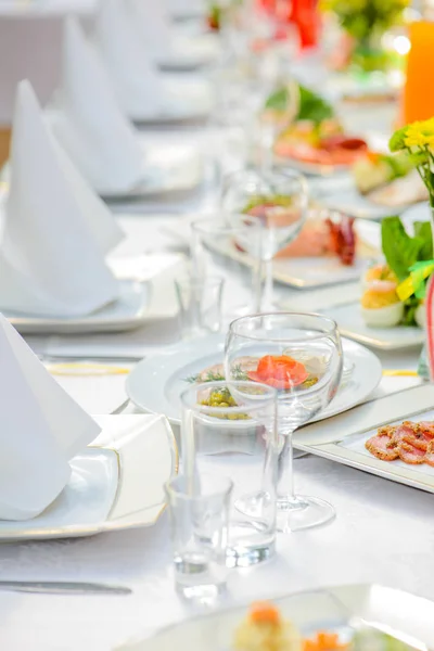 Served table with different dishes Stock Photo