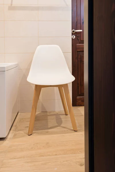 Bathroom interior with bath and stool — Stock Photo, Image