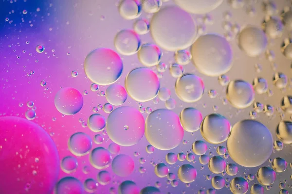 Yağ, su ve sabundan yapılmış çok renkli soyut arka plan resmi