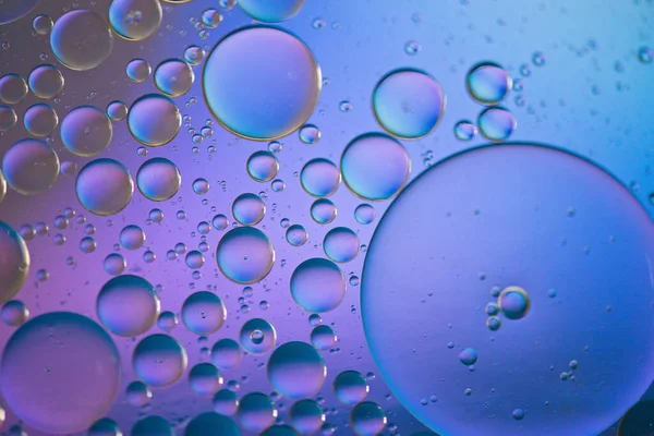 Yağ, su ve sabundan yapılmış çok renkli soyut arka plan resmi