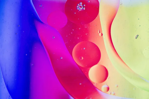 Duha abstraktní rozostřené pozadí obrázek z oleje, vody a mýdla — Stock fotografie