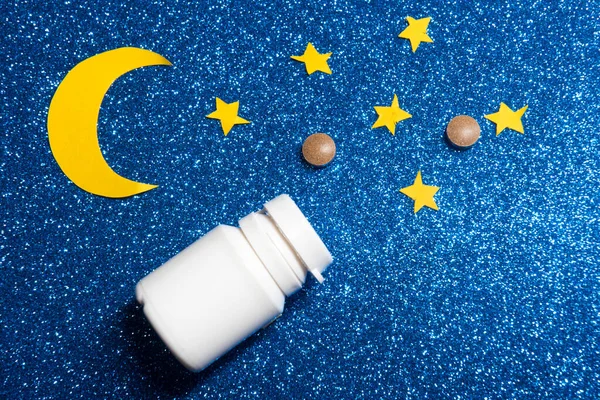 Sky with moon and stars. The concept of sleeping pills