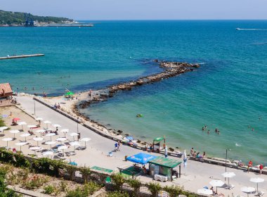  Blue sky, over clear sea water, beach, Black Sea shore. Balchik clipart