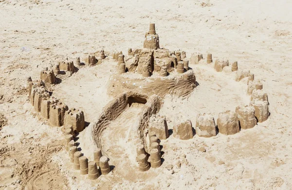 Castle from sand made by children on the beach — Stock Photo, Image