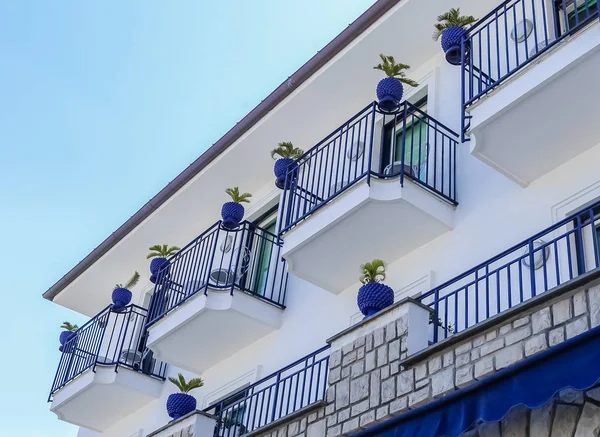 Beautiful hotel with flower on balcony