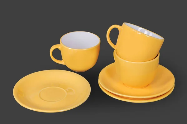 Апельсиновая чашка и блюдце — стоковое фото