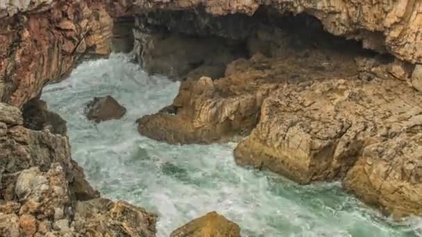 Strong extreme waves crash into grotto cliff cave, Boca do Inferno, Portugal — Stock Video