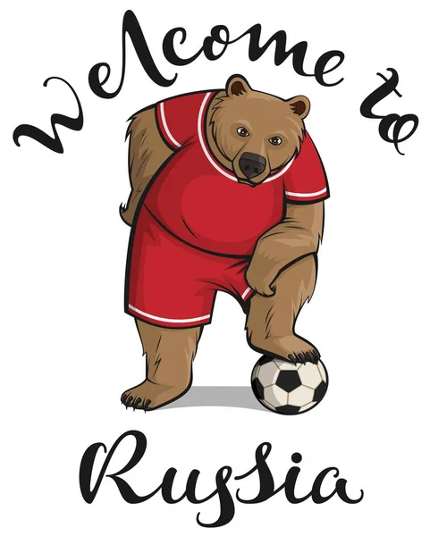 Bienvenido a Rusia texto y oso jugador pisó la pelota de fútbol — Archivo Imágenes Vectoriales