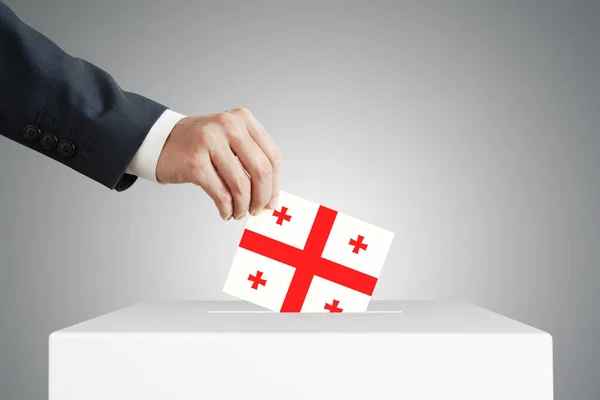 Man Putting Voting Ballot Box Georgian Flag — Stock Photo, Image