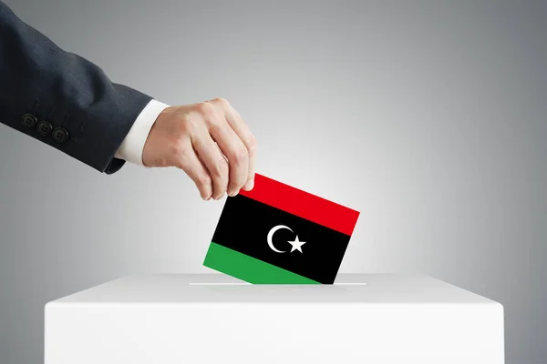 Man Putting Voting Ballot Box Libya Flag — Stock Photo, Image